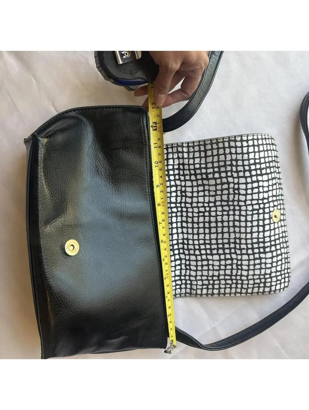 Black Faux Leather Shoulder Bag with Metal Accent and Patterned Interior
